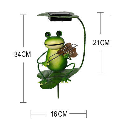 A whimsical solar-powered outdoor lawn lamp designed as a charming frog garden decoration with a ground plug. Perfect for illuminating gardens, pathways, or lawns while adding a playful touch to outdoor spaces.