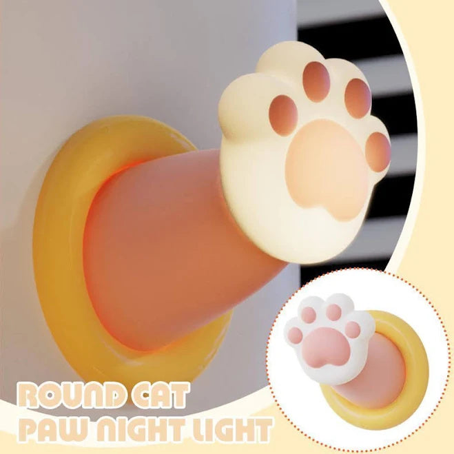 A cozy cat paw-shaped nightstand lamp with dimmable lighting, ideal for home decor. This tap-controlled desk lamp adds a playful and functional touch to any bedroom or workspace.