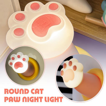 A cozy cat paw-shaped nightstand lamp with dimmable lighting, ideal for home decor. This tap-controlled desk lamp adds a playful and functional touch to any bedroom or workspace.